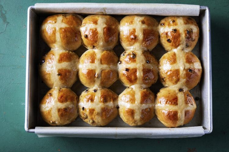 Bourbon-plumped currants enhance flavor of hot cross buns